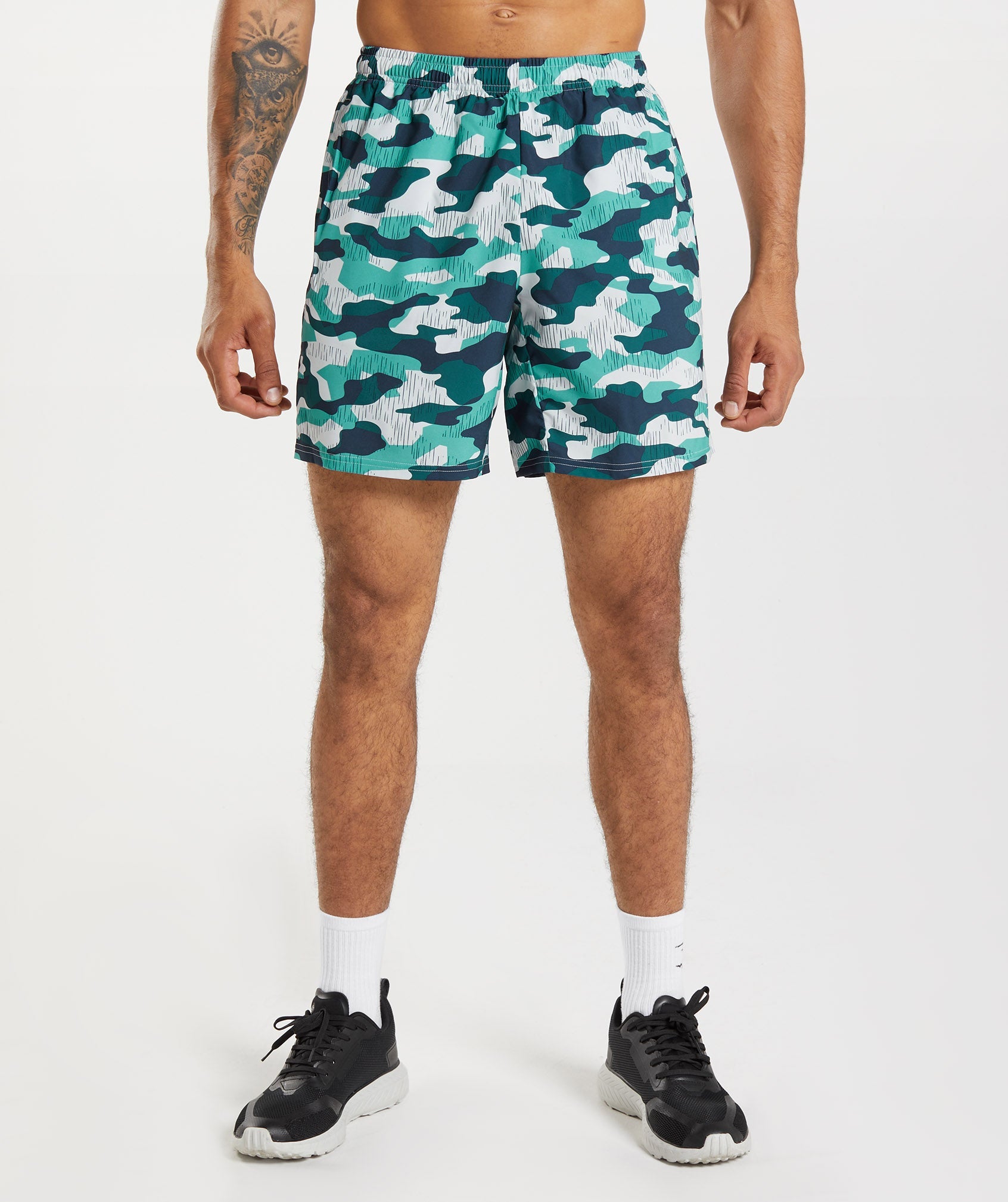 Turquoise Men's Gymshark Arrival 7" Shorts | ESALDX-391