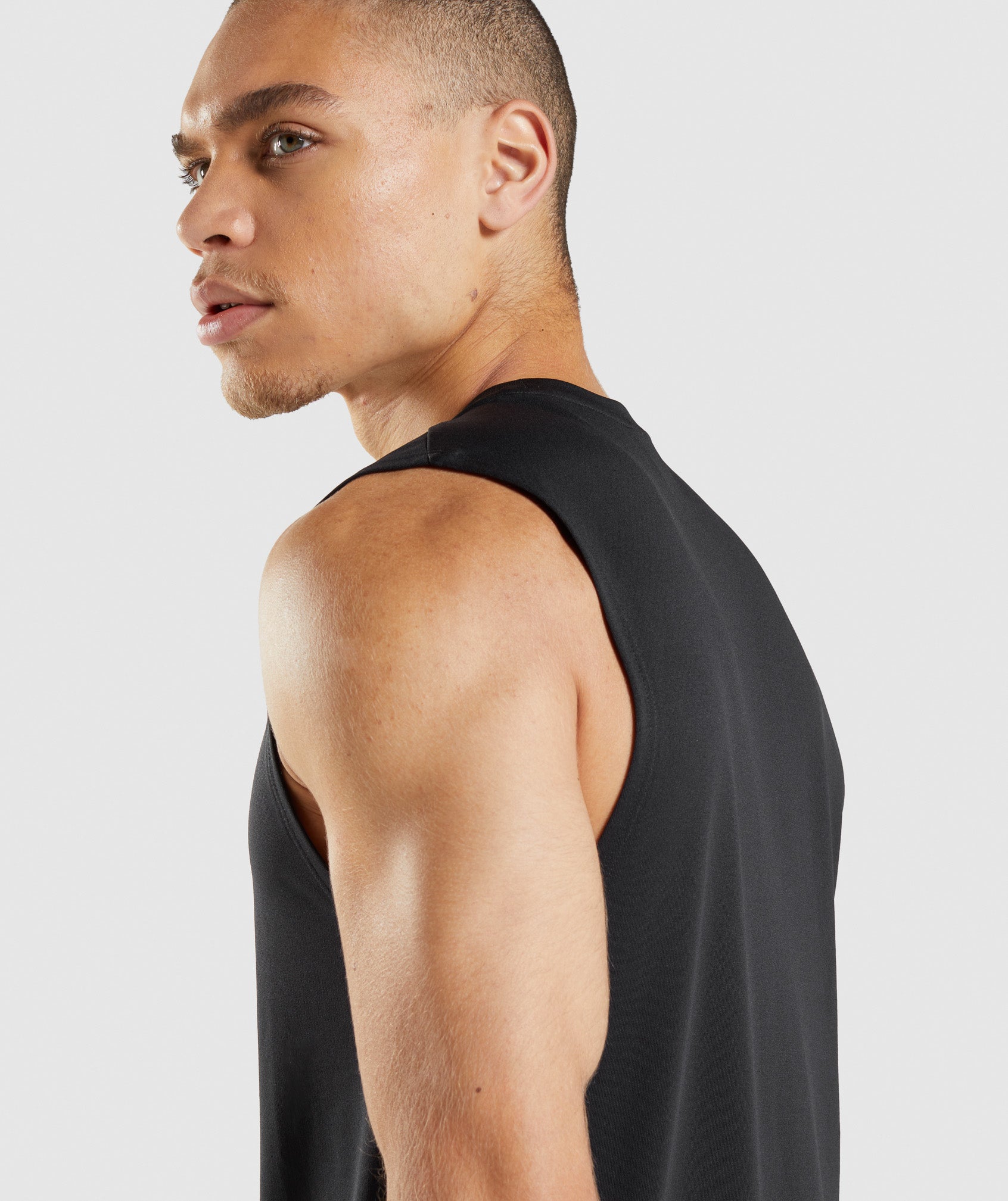 Black Men's Gymshark Arrival Sleeveless T Shirts | XFQLCV-413