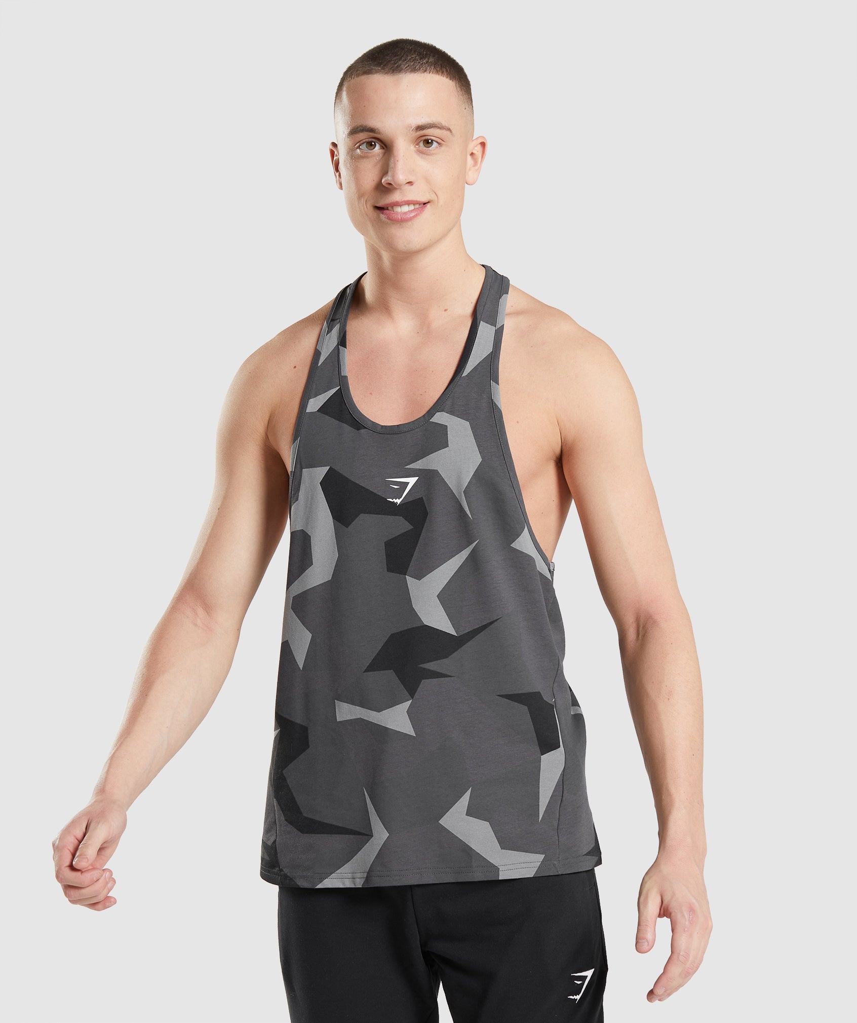 Black Men\'s Gymshark Critical Stringer Vest | UNVEIW-308