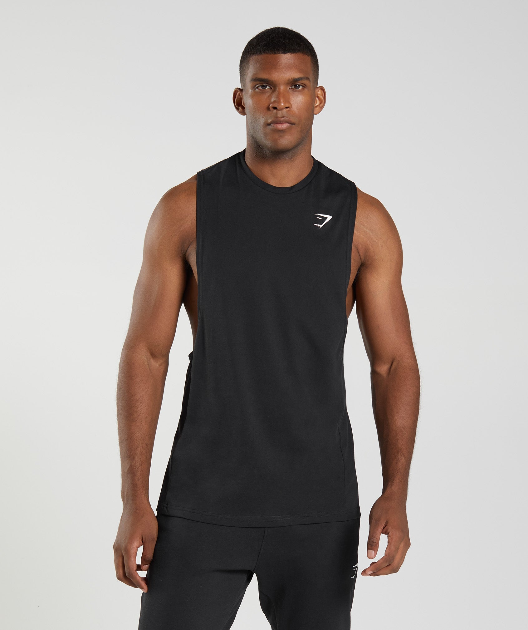 Black Men\'s Gymshark React Drop Arm Tanks | ZYWFLE-346