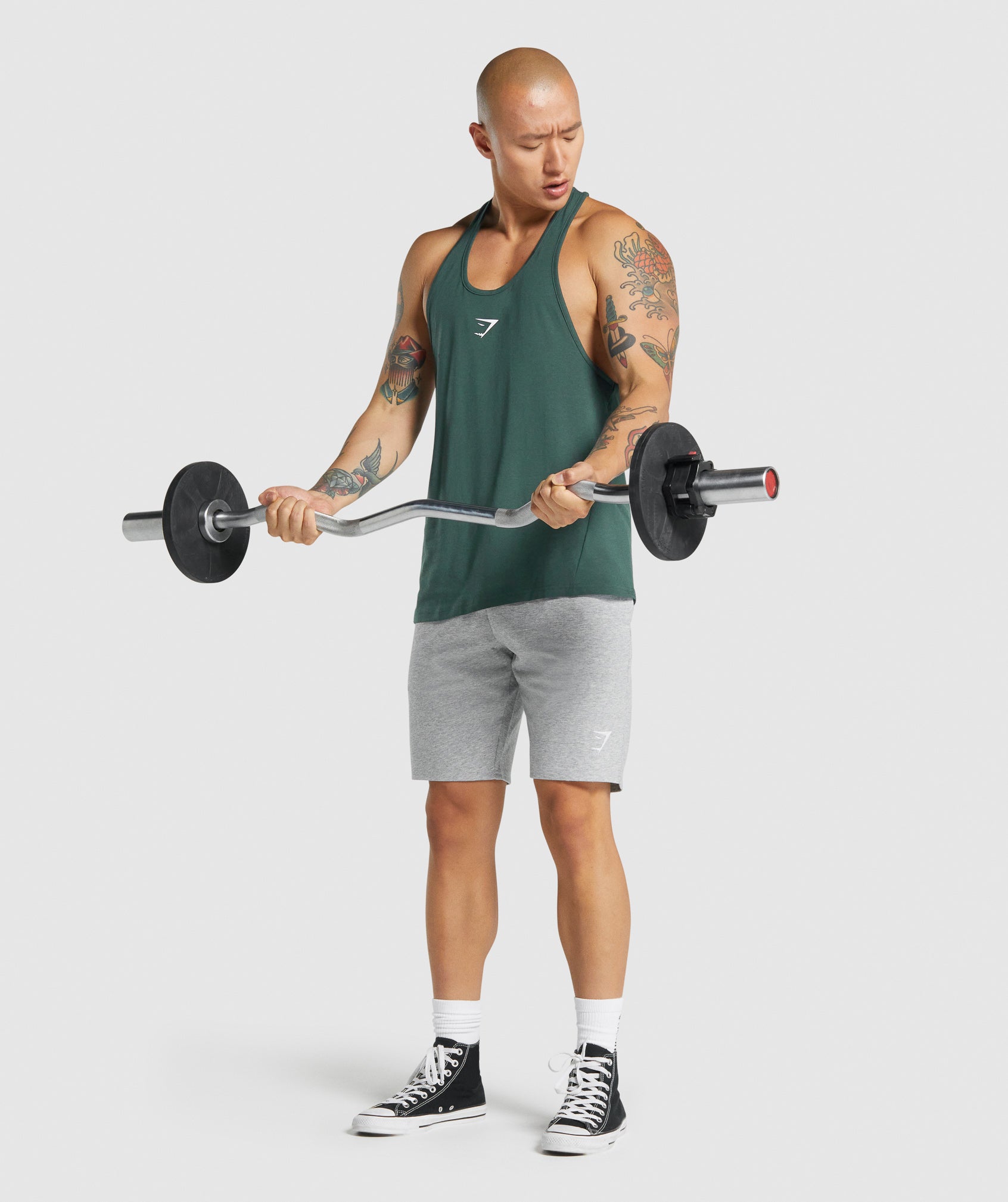 Dark Green Men's Gymshark Critical 2.0 Stringer Vest | JEKSYF-927