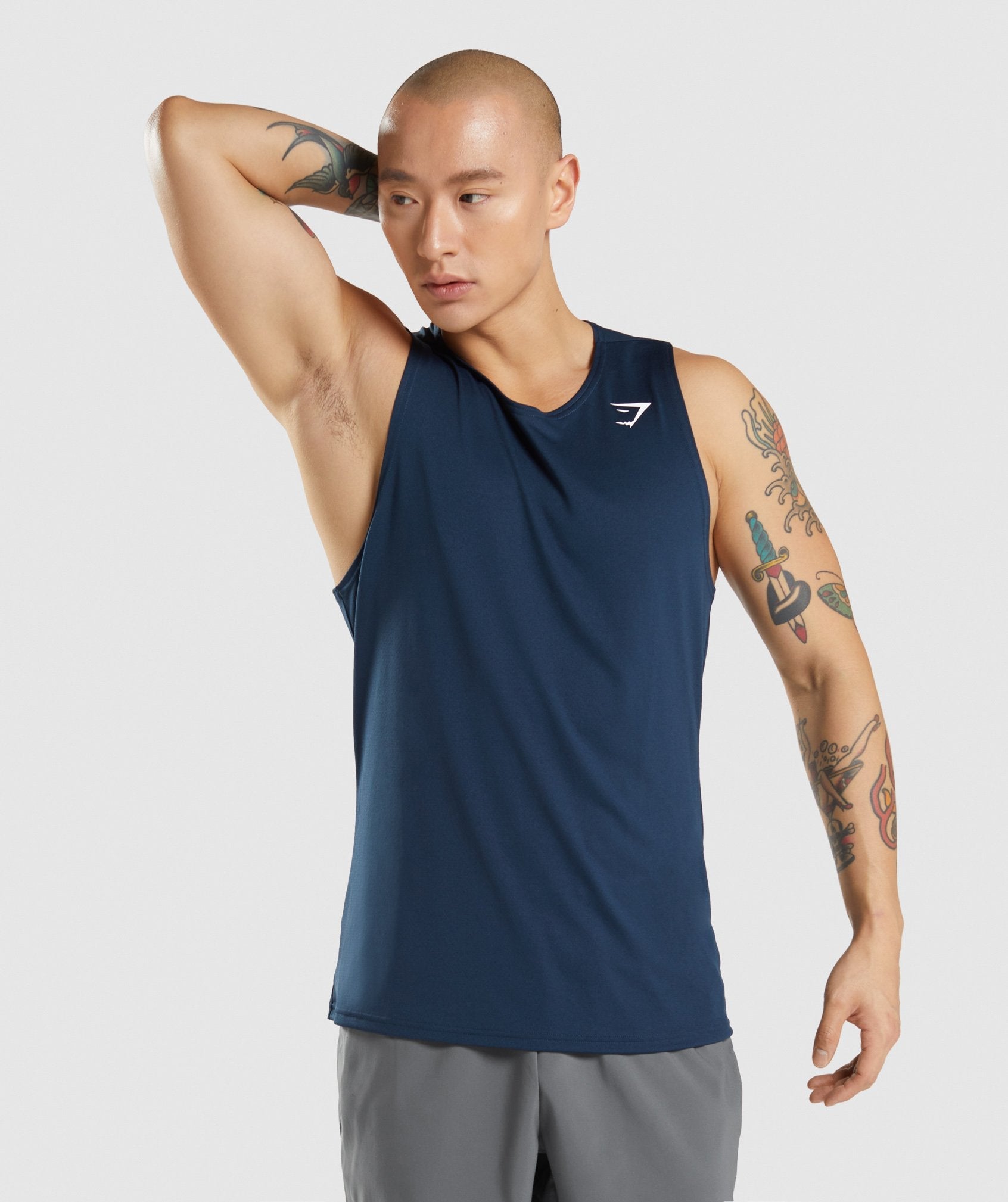 Navy Men\'s Gymshark Arrival Tanks | CNJWAU-301