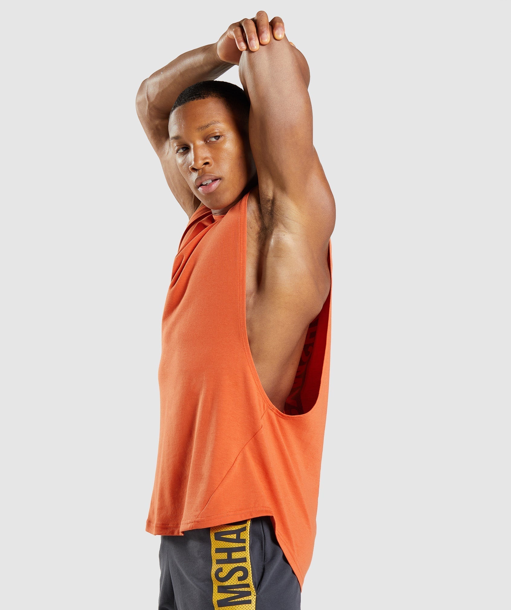 Orange Men's Gymshark Bold Drop Arm Tanks | YXLIBG-702