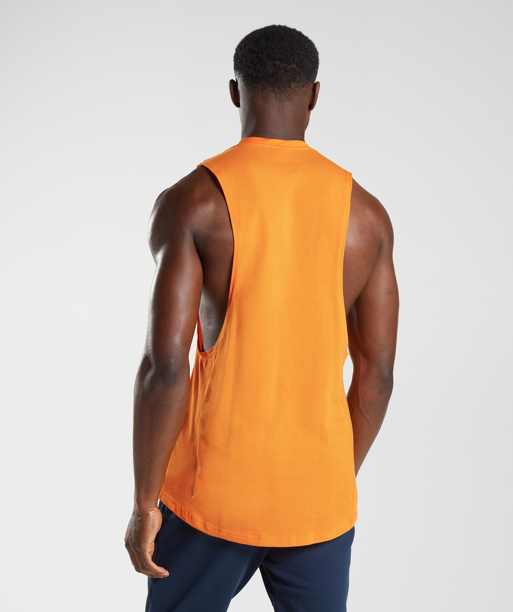 Orange Men's Gymshark React Drop Arm Tanks | PWDIVT-125