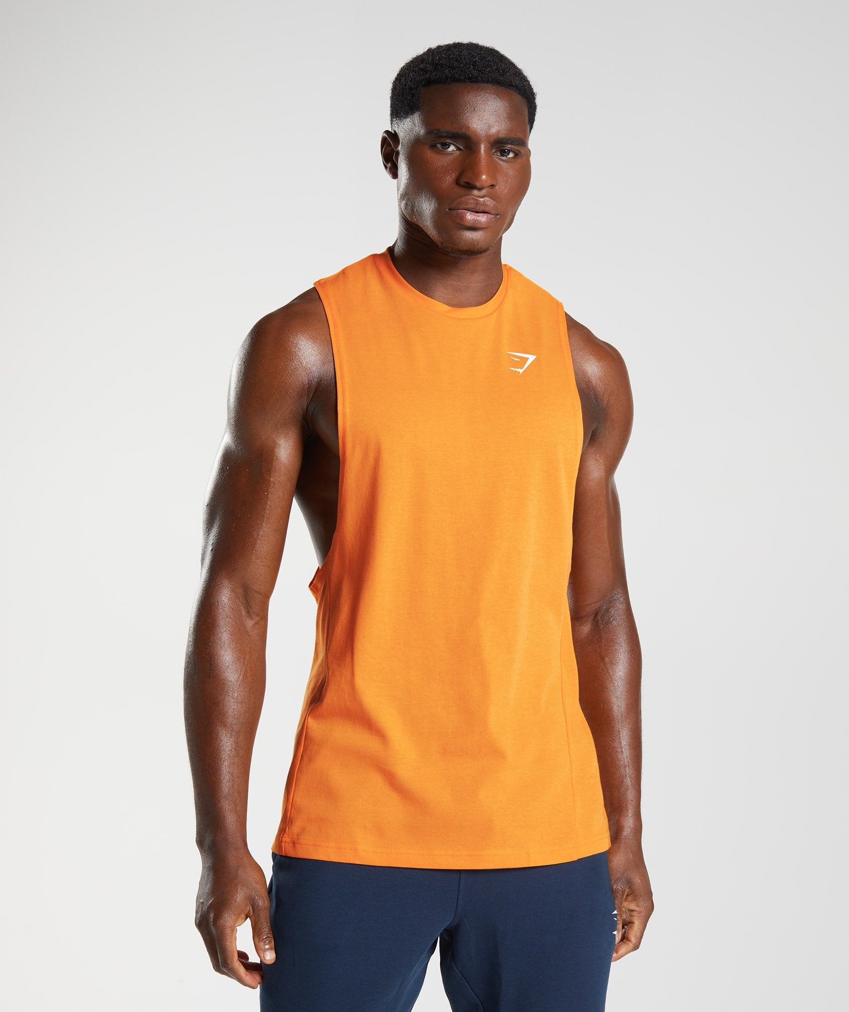 Orange Men\'s Gymshark React Drop Arm Tanks | PWDIVT-125