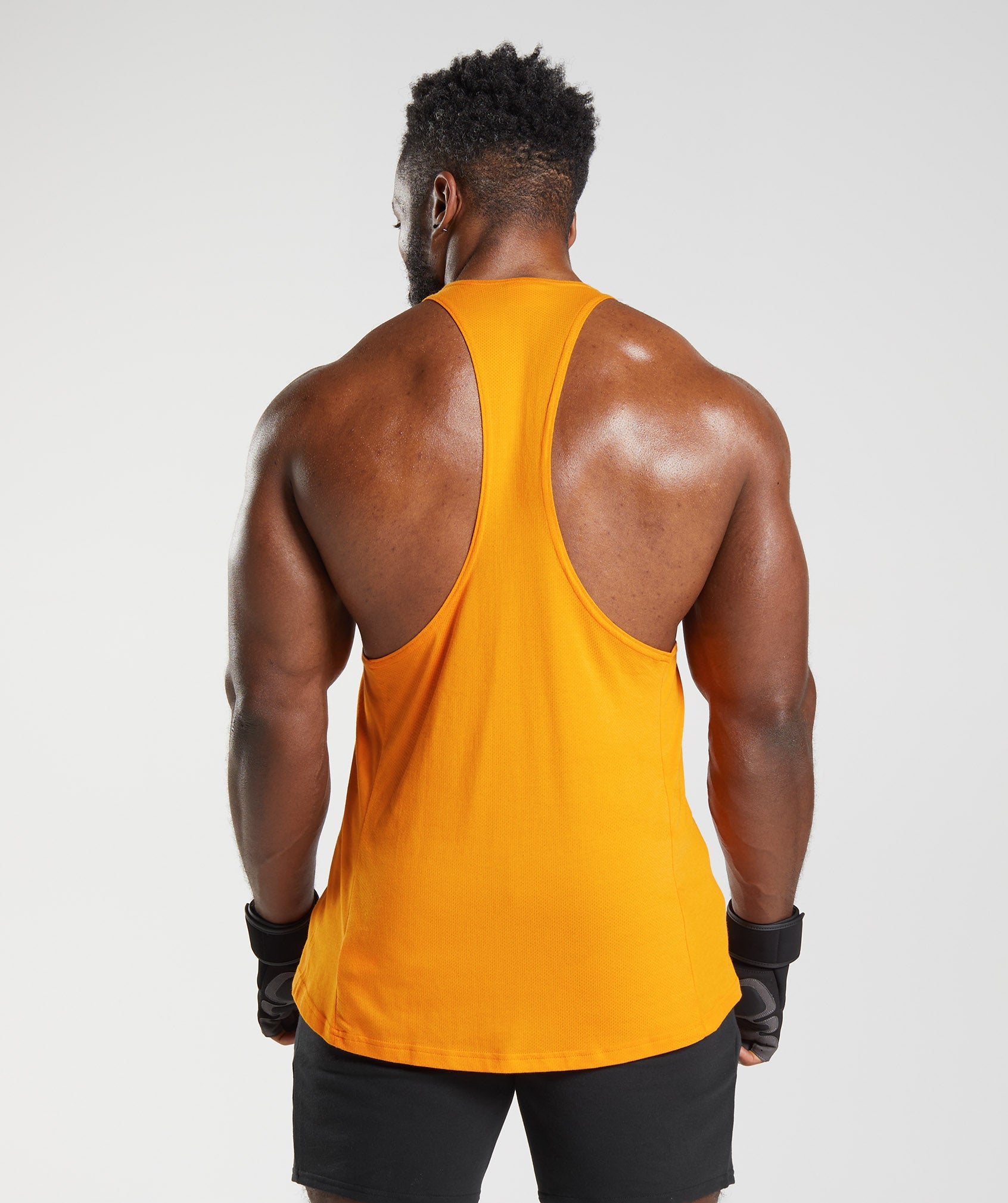 Orange Men's Gymshark React Stringer Vest | NHPXDL-063