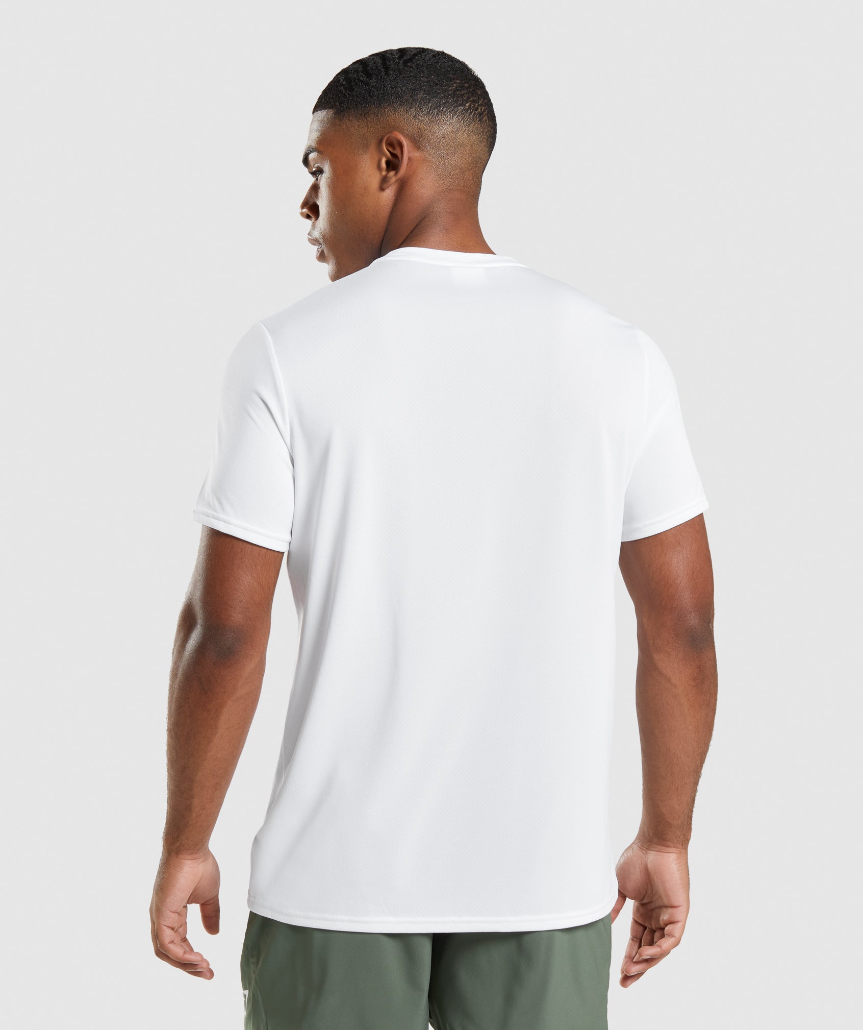 White Men's Gymshark Arrival Regular Fit T Shirts | GQDMVX-710