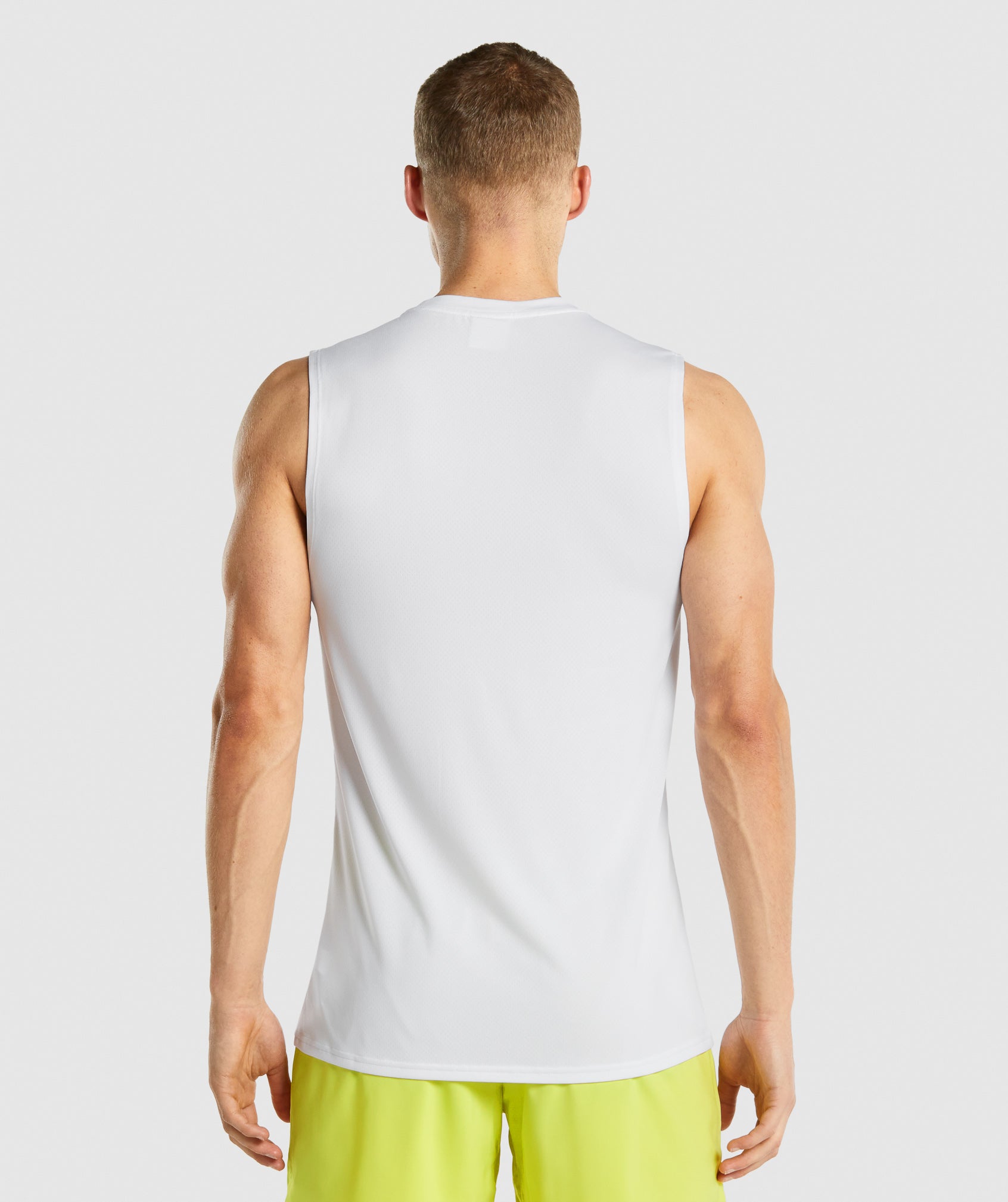 White Men's Gymshark Arrival Sleeveless T Shirts | QWDOAK-012